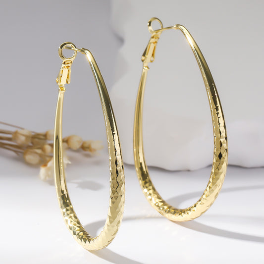 Golden Glossy Spring Fastener Egg-shaped Earrings Hypoallergenic Copper